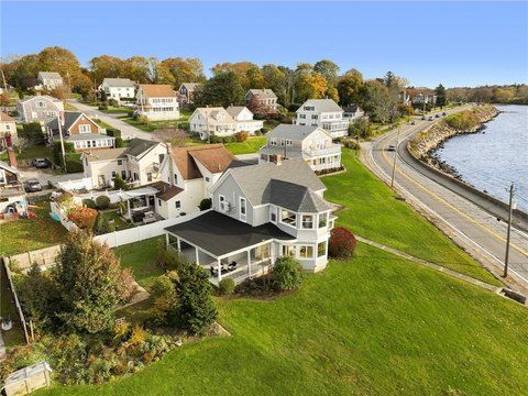 Aerial view of waterfront homes along the Sakonnet River shoreline in Tiverton.