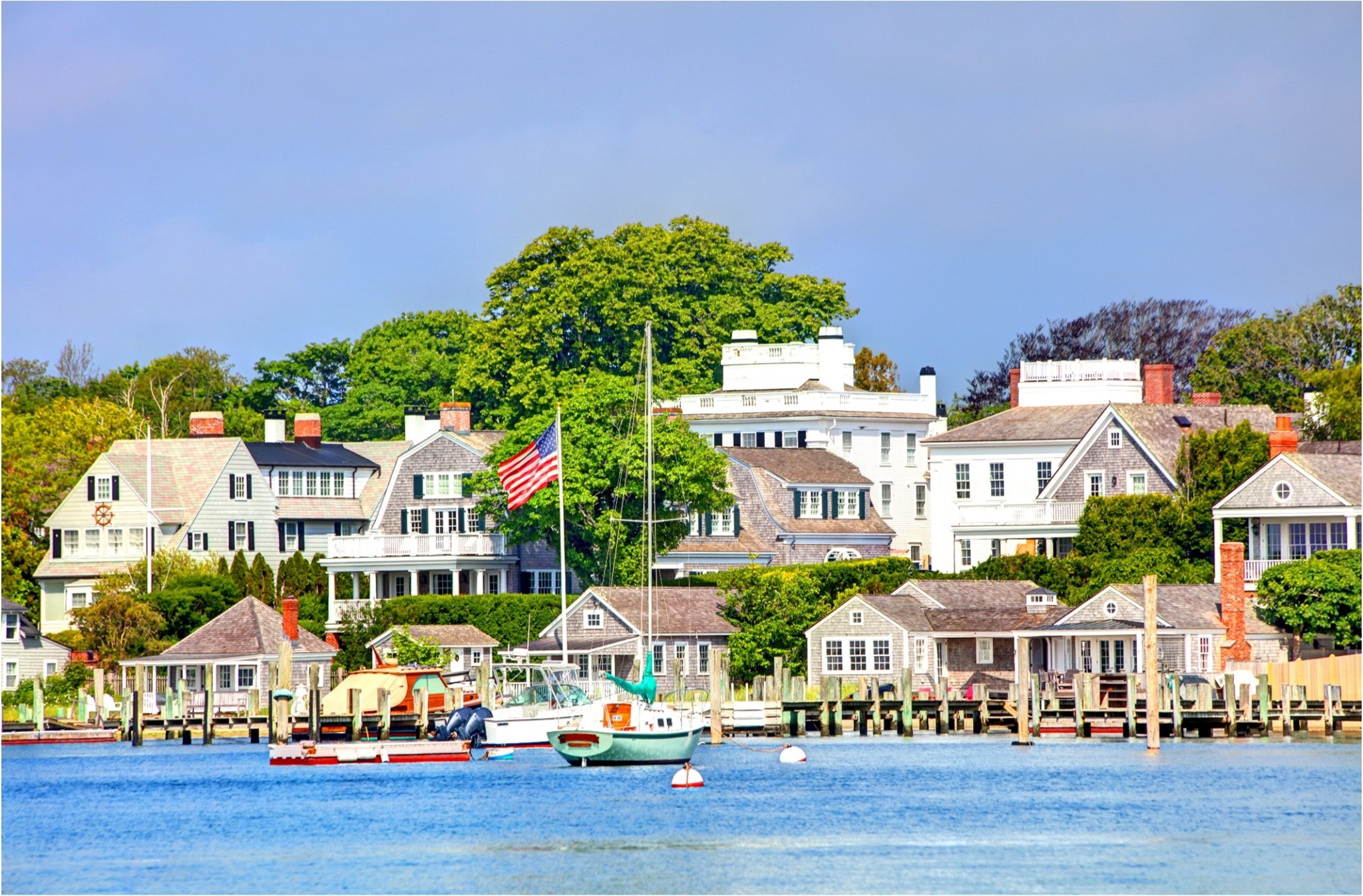 Waterfront captain's houses and moored boats along Edgartown Harbor on Martha's Vineyard